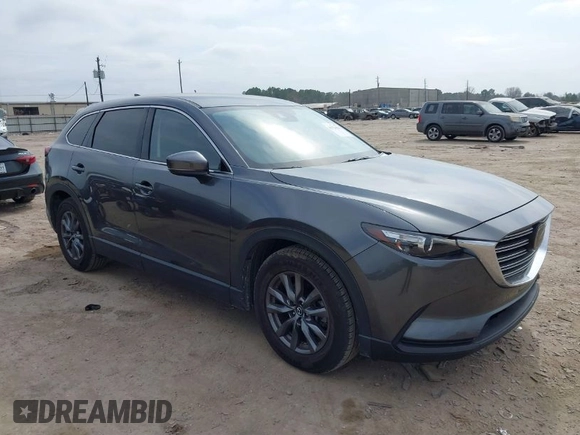 2021 Mazda CX-9 Touring with VIN JM3TCACY7M0516185, listed as a IAAI auction lot 41524084 with 53,084 mi miles. Bid and sale history available at carsss.com. Image 1.