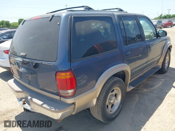 2000 Ford Explorer z VIN 1FMZU64P3YZB70619, wystawiony jako IAAI lot #42000128 z przebiegiem 230 681 mil mil oraz . Historia ofert i sprzedaży dostępna na DreamBid. Obrazek 4.