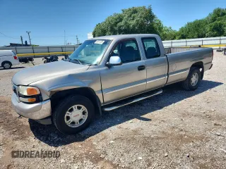 2001 GMC Sierra 1500 SLE with VIN 1GTEK19T61E323721, listed as a Copart auction lot 59801105 with 223,261 mi miles and Salvage title. Bid and sale history available at DreamBid. Image 1.