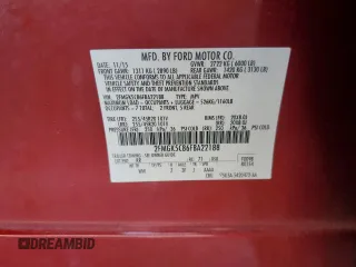 2015 Ford Flex SEL z VIN 2FMGK5C86FBA22188, wystawiony jako Copart lot #50489805 z przebiegiem 102 580 mil mil oraz Szkody całkowita. Historia ofert i sprzedaży dostępna na DreamBid. Obrazek 13.