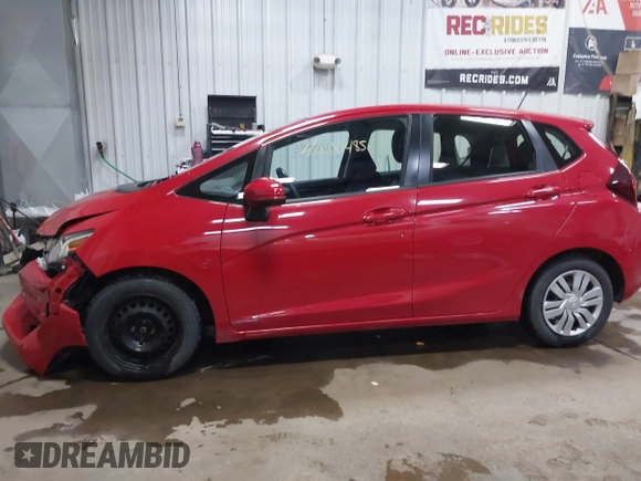 2016 Honda Fit LX z VIN JHMGK5H51GX006007, wystawiony jako IAAI lot #41600485 z przebiegiem 49 758 mil mil oraz . Historia ofert i sprzedaży dostępna na DreamBid. Obrazek 15.