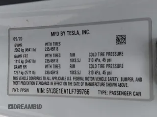 2020 Tesla Model 3 Standard Range Plus with VIN 5YJ3E1EA1LF799766, listed as a IAAI auction lot 41386508 with 90,000 mi miles. Bid and sale history available at carsss.com. Image 9.