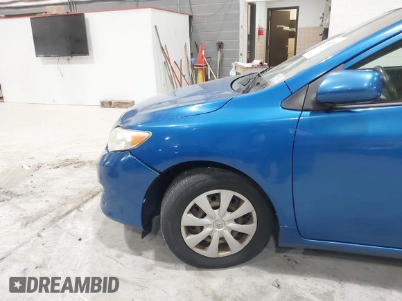 2009 Toyota Corolla with VIN JTDBL40E699037792, listed as a IAAI auction lot 41838231 with 199,690 mi miles. Bid and sale history available at carsss.com. Image 12.