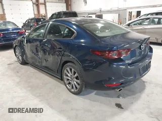 2021 Mazda 3 Select with VIN 3MZBPBBL3MM251893, listed as a IAAI auction lot 41854476 with 56,661 mi miles and . Bid and sale history available at DreamBid. Image 3.