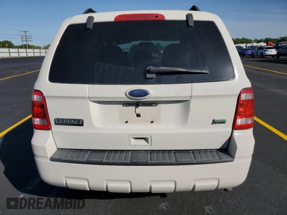 2010 Ford Escape XLT с VIN 1FMCU9DG0AKC78735, выставлен на аукционе Copart как лот 58376425 с пробегом 213 183 миль миль и Списание • Salvage title. История ставок и продаж доступна на DreamBid. Изображение 6.