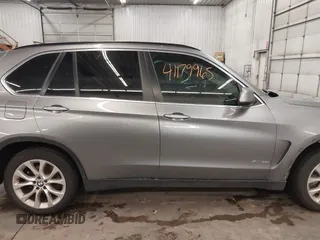 2016 BMW X5 xDrive35i z VIN 5UXKR0C5XG0U12540, wystawiony jako IAAI lot #41179965 z przebiegiem 75 997 mil mil oraz . Historia ofert i sprzedaży dostępna na DreamBid. Obrazek 14.