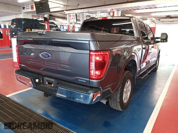 2021 Ford F-150 XL with VIN 1FTFW1E81MKE96112, listed as a IAAI auction lot 42788387 with 101,494 mi miles and . Bid and sale history available at DreamBid. Image 23.