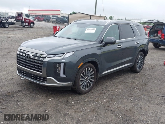 2024 Hyundai Palisade Calligraphy z VIN KM8R7DGE5RU806672, wystawiony jako IAAI lot #42119069 z przebiegiem 8 325 mil mil oraz . Historia ofert i sprzedaży dostępna na DreamBid. Obrazek 2.