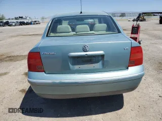1999 Volkswagen Passat GL z VIN WVWMD63BXXE058992, wystawiony jako Copart lot #57342545 z przebiegiem 89 523 mil mil oraz Szkoda całkowita • Salvage title. Historia ofert i sprzedaży dostępna na DreamBid. Obrazek 6.