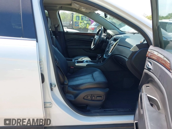 2012 Cadillac SRX Performance Collection z VIN 3GYFNBE39CS628740, wystawiony jako IAAI lot #42063414 z przebiegiem 88 260 mil mil oraz . Historia ofert i sprzedaży dostępna na DreamBid. Obrazek 5.
