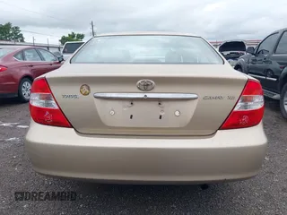 2002 Toyota Camry LE z VIN 4T1BE32K52U086150, wystawiony jako IAAI lot #42126685 z przebiegiem 175 212 mil mil oraz . Historia ofert i sprzedaży dostępna na DreamBid. Obrazek 16.
