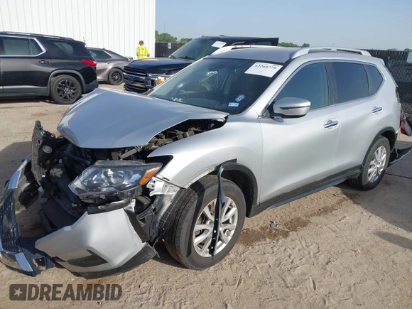 2019 Nissan Rogue SV with VIN KNMAT2MT0KP527901, listed as a IAAI auction lot 42260779 with 102,975 mi miles and . Bid and sale history available at DreamBid. Image 2.