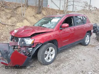 2014 Jeep Compass Latitude with VIN 1C4NJDEB3ED846496, listed as a IAAI auction lot 41892963 with 111,914 mi miles. Bid and sale history available at carsss.com. Image 2.