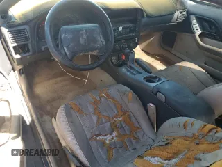 1997 Chevrolet Camaro Z28 z VIN 2G1FP22P0V2107947, wystawiony jako Copart lot #43237785 z przebiegiem Nie podano mil oraz Czysty tytuł • Clean title. Historia ofert i sprzedaży dostępna na DreamBid. Obrazek 8.