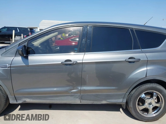 2014 Ford Escape SE with VIN 1FMCU0GX8EUD57801, listed as a IAAI auction lot 41856252 with 136,980 mi miles. Bid and sale history available at carsss.com. Image 15.