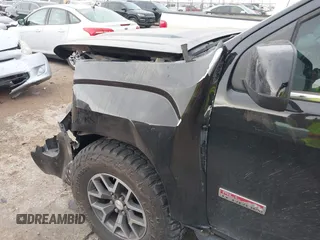 2015 GMC Canyon 4WD SLE with VIN 1GTG6BE39F1196261, listed as a IAAI auction lot 41703057 with 116,215 mi miles and . Bid and sale history available at carsss.com. Image 6.