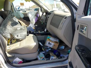2009 Ford Escape Hybrid with VIN 1FMCU49369KA60514, listed as a IAAI auction lot 42203433 with 196,000 mi miles and . Bid and sale history available at DreamBid. Image 5.