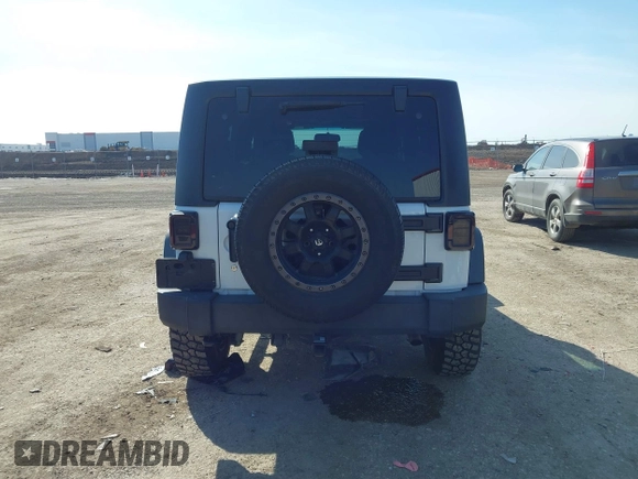 2014 Jeep Wrangler Unlimited Sport with VIN 1C4BJWDG2EL100591, listed as a IAAI auction lot 41578357 with 155,929 mi miles and . Bid and sale history available at DreamBid. Image 16.