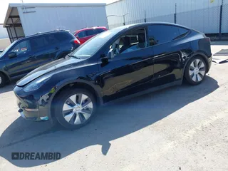 2024 Tesla Model Y Long Range z VIN 7SAYGDEE0RF078242, wystawiony jako IAAI lot #41808826 z przebiegiem 59 581 mil mil oraz . Historia ofert i sprzedaży dostępna na DreamBid. Obrazek 2.