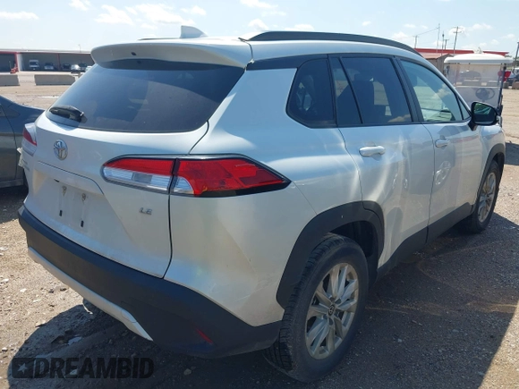 2022 Toyota Corolla Cross LE z VIN 7MUCAAAG0NV014812, wystawiony jako IAAI lot #42335853 z przebiegiem 52 811 mil mil oraz . Historia ofert i sprzedaży dostępna na DreamBid. Obrazek 4.