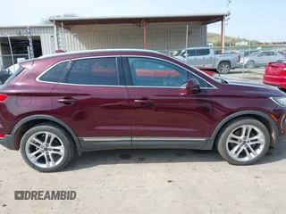 2016 Lincoln MKC Reserve z VIN 5LMCJ3D93GUJ20035, wystawiony jako IAAI lot #41898141 z przebiegiem 144 152 mil mil oraz . Historia ofert i sprzedaży dostępna na DreamBid. Obrazek 14.