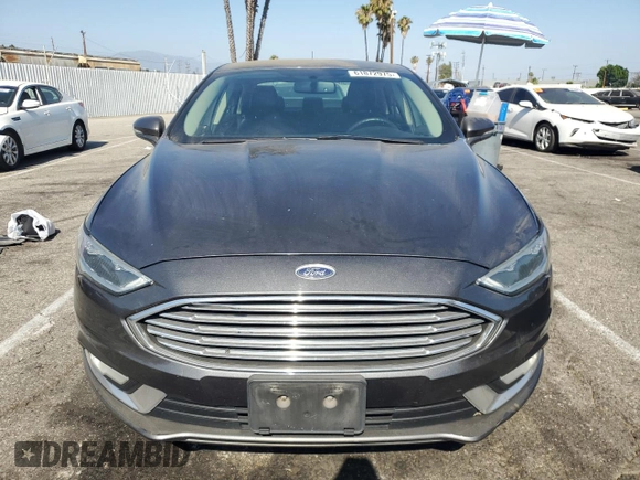 2017 Ford Fusion SE with VIN 3FA6P0HD7HR247627, listed as a Copart auction lot 61872975 with 230,032 mi miles and Salvage title. Bid and sale history available at DreamBid. Image 5.