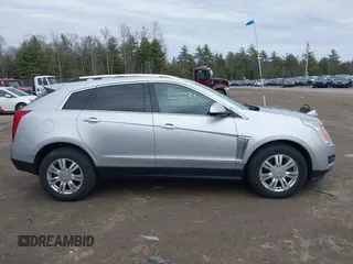 2014 Cadillac SRX Luxury Collection z VIN 3GYFNEE33ES670356, wystawiony jako IAAI lot #42008087 z przebiegiem 59 953 mil mil oraz . Historia ofert i sprzedaży dostępna na DreamBid. Obrazek 14.