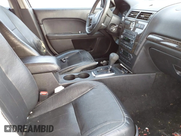 2008 Mercury Milan Premier with VIN 3MEHM02128R609324, listed as a IAAI auction lot 41213842 with 118,968 mi miles and . Bid and sale history available at DreamBid. Image 5.