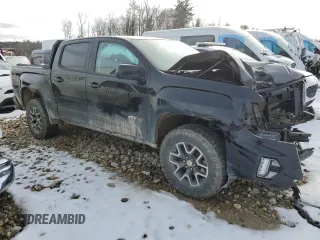 2022 GMC Canyon 4WD AT4 w/Leather with VIN 1GTG6FENXN1294450, listed as a Copart auction lot 80999634 with 0 mi miles and Salvage Title. Bid and sale history available at carsss.com. Image 4.