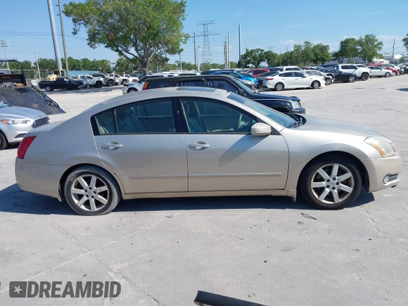 2004 Nissan Maxima SL with VIN 1N4BA41E14C931267, listed as a IAAI auction lot 41911875 with 129,161 mi miles. Bid and sale history available at carsss.com. Image 13.