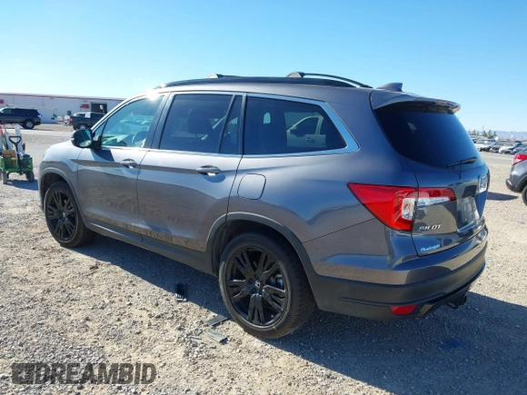 2022 Honda Pilot Special Edition with VIN 5FNYF5H27NB013972, listed as a IAAI auction lot 41219766 with 52,291 mi miles and . Bid and sale history available at carsss.com. Image 3.