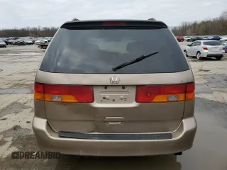 2004 Honda Odyssey EX with VIN 5FNRL186X4B127827, listed as a Copart auction lot 51602565 with 182,127 mi miles and Salvage Title. Bid and sale history available at DreamBid. Image 6.