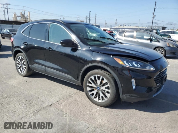 2021 Ford Escape Titanium with VIN 1FMCU9J93MUA54213, listed as a Copart auction lot 59211045 with Not provided miles and Salvage title. Bid and sale history available at DreamBid. Image 4.