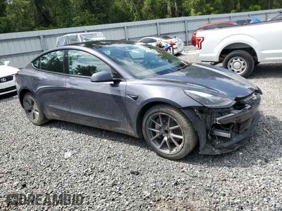 2023 Tesla Model 3 z VIN 5YJ3E1EA1PF692481, wystawiony jako Copart lot #61764165 z przebiegiem 22 649 mil mil oraz Szkoda całkowita • Salvage title. Historia ofert i sprzedaży dostępna na DreamBid. Obrazek 4.