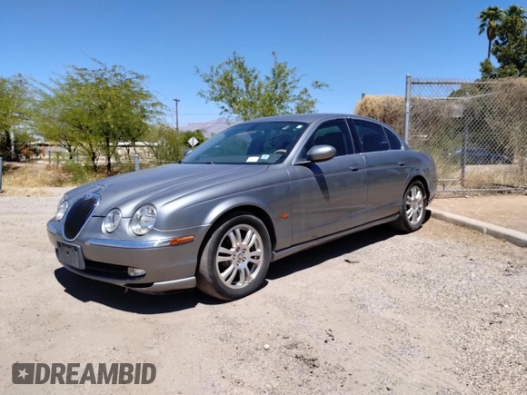 2003 Jaguar S-Type with VIN SAJEA01U93HM78946, listed as a Copart auction lot 54582105 with 132,560 mi miles and Clean Title. Bid and sale history available at DreamBid. Image 2.