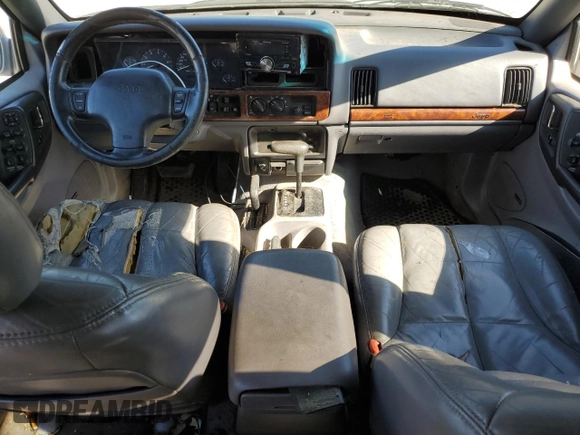 1997 Jeep Grand Cherokee Limited with VIN 1J4GZ78Y5VC598822, listed as a Copart auction lot 74306474 with 276,454 mi miles and Salvage Title. Bid and sale history available at carsss.com. Image 8.