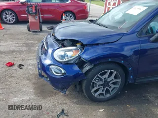 2021 FIAT 500X Trekking with VIN ZFBNF3B10MP945509, listed as a IAAI auction lot 42299963 with 35,474 mi miles and . Bid and sale history available at DreamBid. Image 6.