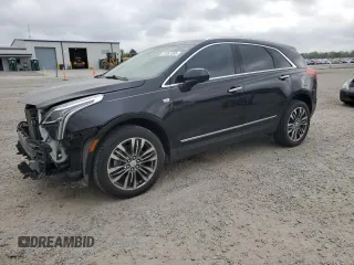 2018 Cadillac XT5 Premium Luxury FWD z VIN 1GYKNERS6JZ119030, wystawiony jako Copart lot #51067385 z przebiegiem 91 318 mil mil oraz Szkody całkowita. Historia ofert i sprzedaży dostępna na DreamBid. Obrazek 1.