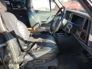 1996 Jeep Cherokee z VIN 1J4FN78S8TL160974, wystawiony jako Copart lot #83425604 z przebiegiem 336 313 mil mil oraz Szkoda całkowita • Salvage title. Historia ofert i sprzedaży dostępna na DreamBid. Obrazek 7.