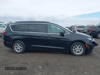 2022 Chrysler Pacifica Touring L with VIN 2C4RC1BG2NR117879, listed as a IAAI auction lot 41845778 with 96,523 mi miles and . Bid and sale history available at DreamBid. Image 13.