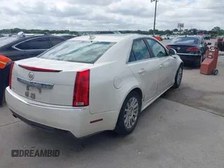 2012 Cadillac CTS Luxury with VIN 1G6DF5E50C0131857, listed as a IAAI auction lot 42610389 with 85,896 mi miles and . Bid and sale history available at DreamBid. Image 4.