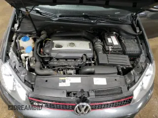 2013 Volkswagen GTI с VIN WVWGD7AJXDW129840, выставлен на аукционе Copart как лот 52946845 с пробегом 118 520 миль миль и Списание • Salvage title. История ставок и продаж доступна на DreamBid. Изображение 11.