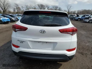 2018 Hyundai Tucson SEL with VIN KM8J33A4XJU714805, listed as a Copart auction lot 51388195 with 104,652 mi miles and Salvage Title. Bid and sale history available at carsss.com. Image 6.