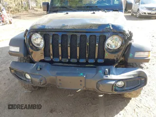 2022 Jeep Wrangler Unlimited Sport with VIN 1C4HJXDN6NW132859, listed as a IAAI auction lot 41362657 with 40,066 mi miles and . Bid and sale history available at DreamBid. Image 6.