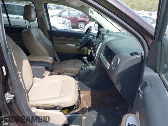 2014 Jeep Compass Latitude with VIN 1C4NJDEBXED622352, listed as a IAAI auction lot 42130403 with 149,024 mi miles. Bid and sale history available at carsss.com. Image 5.