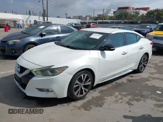 2016 Nissan Maxima S with VIN 1N4AA6AP2GC430689, listed as a IAAI auction lot 41913701 with 132,637 mi miles and . Bid and sale history available at DreamBid. Image 2.