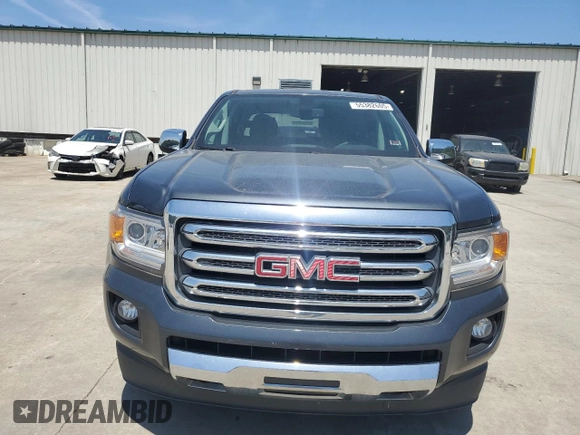 2015 GMC Canyon 4WD SLT z VIN 1GTG6CE30F1182562, wystawiony jako Copart lot #55382605 z przebiegiem 97 183 mil mil oraz Szkoda całkowita • Salvage title. Historia ofert i sprzedaży dostępna na DreamBid. Obrazek 5.