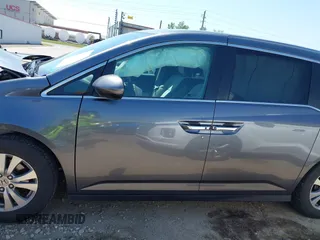 2016 Honda Odyssey SE with VIN 5FNRL5H33GB125693, listed as a IAAI auction lot 41994036 with 163,617 mi miles and . Bid and sale history available at DreamBid. Image 15.