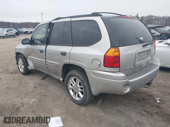2004 GMC Envoy SLE with VIN 1GKDT13SX42135951, listed as a IAAI auction lot 41668252 with 216,193 mi miles. Bid and sale history available at carsss.com. Image 3.