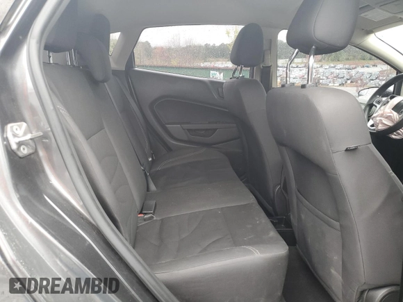 2018 Ford Fiesta SE z VIN 3FADP4EJ5JM103411, wystawiony jako Copart lot #50130325 z przebiegiem 111 247 mil mil oraz Szkoda całkowita • Salvage title. Historia ofert i sprzedaży dostępna na DreamBid. Obrazek 11.